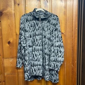 3/4 length zip up, used but great condition. Multi colored